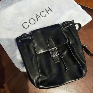 Authentic Coach backpack style purse.